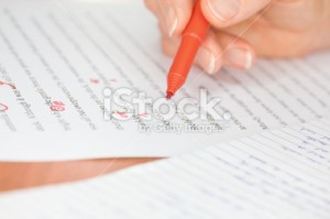 stock-photo-21479480-hand-with-red-pen-transcribing-a-story